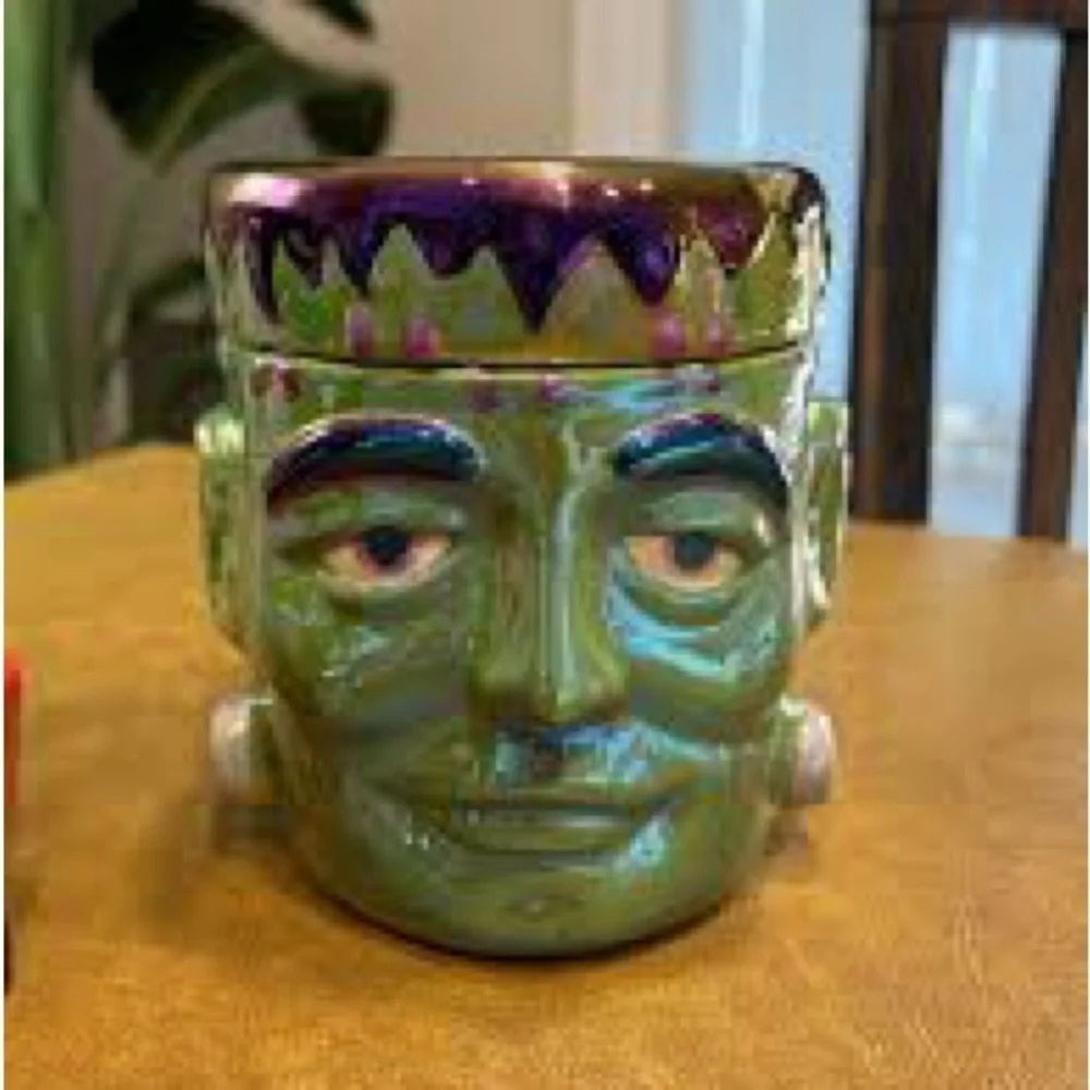 Green Frankenstein oversized candle - bobbing for apples